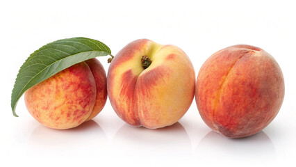 Three ripe peaches with a leaf isolated on white background, a delicious and healthy fruit for a balanced diet and lifestyle