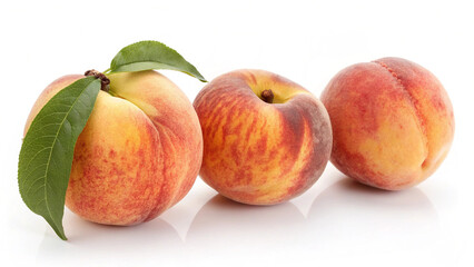 Three ripe peaches with a leaf isolated on white background, a delicious and healthy fruit for a balanced diet and lifestyle