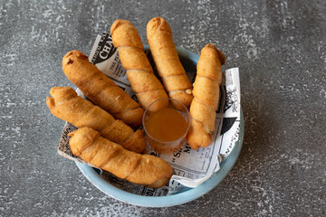 Venezuelan tequeños with savory cheese and dipping sauce