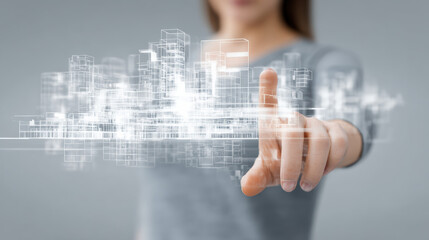 Focused female hand interacts with minimal hologram of an office complex. Business technology shows futuristic urban innovation and design