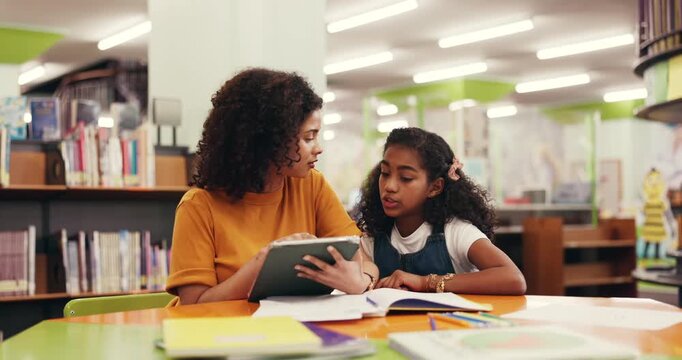 Tutor, child and lesson with tablet in library for elearning, homework assignment and assistance. Academic mentor, girl student and digital app at school for online learning, test preparation or help - Powered by Adobe