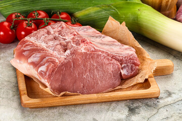 Raw pork loin cut with bone