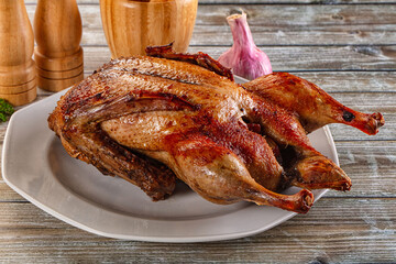 Baked with spices whole duck