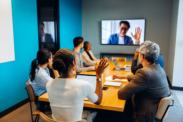 Meeting attendees engage with a virtual presenter during a conference