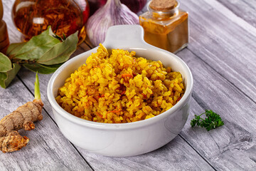 Indian yellow curry rice with tumeric