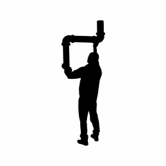 Silhouette of a plumber fixing an underground pipeline isolated on white background