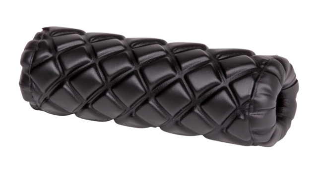 Close up of a black textured foam roller featuring a prominent raised diamond pattern on its cylindrical surface Isolate