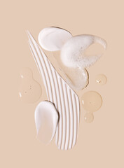 composition of skin care cosmetic product samples, smear of cream and gel texture on light background, moisturizing and skin care concept