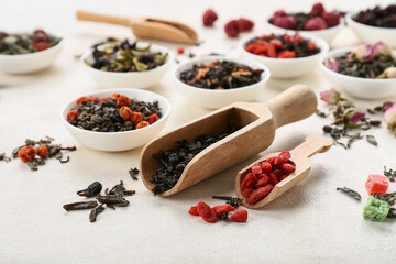 Different fruit tea on light background