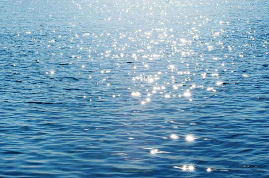 Lights on sea background. Waves.