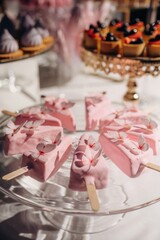 Many of the sweets in shape of ice cream on the table, celebration