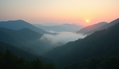 Fototapeta premium Misty mountain valley at sunrise with soft pastel sky and rolling hills mountains