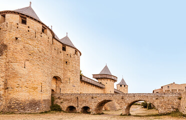 Medieval fortress walls and towers of Carcassonne at sunset, citadel, Languedoc region, France.