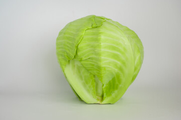 Fototapeta premium fresh green cabbage on white background, healthy food