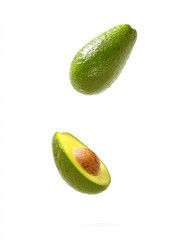 Avocado falling down isolated on white background.