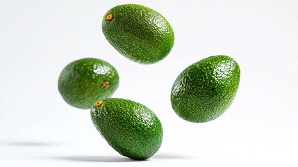 Avocado falling down isolated on white background.