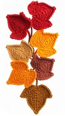 Fall Colored Knitted Leaves Decor on a White Backdrop for Seasonal Decorations
