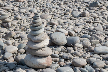 Stone Cairn on a Rocky Beach