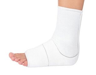 A wrapped ankle with a white bandage, showcasing the foot and lower leg in a supportive, healing position.