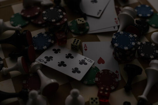 Gamepad, laying cards with the chips on the table.