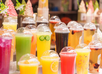 Colorful fruit juice drinks displayed