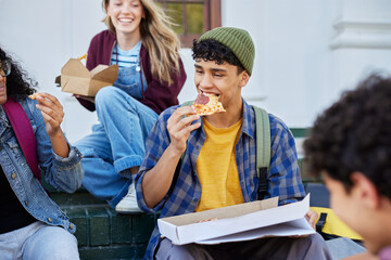 Multiethnic guy enjoying pizza with his friends outdoor
