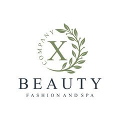 Initial letter x green leaves natural organic logo design for to beauty fashion and spa design graphic 