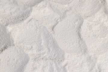 white powdered sugar made from ground beet sugar, white crumbly powdered sugar made from natural...