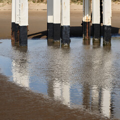Reflection of wooden legs