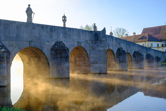 Historic Fischhofbr�cke stone bridge in Tirschenreuth with morning mist