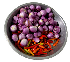 Overhead Shot of Shallots and Chili Peppers