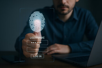Man using biometric fingerprint scanner to log in. Concept of digital security, online privacy, user authentication and modern technology access.