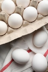 Raw chicken eggs on table, above view