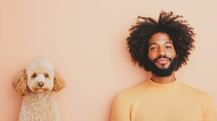 Confident young African American man with a curly afro hairstyle and his poodle dog
