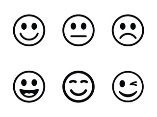 Set of smiley face icons showing different emotions, black and white emoji expressions including happy, sad, neutral, laughing, smiling, and winking faces