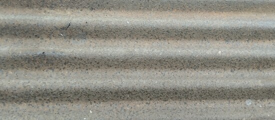 Close-up of rusty corrugated metal sheeting texture