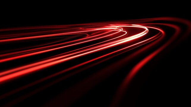 glowing red light trails on dark background representing speed and energy