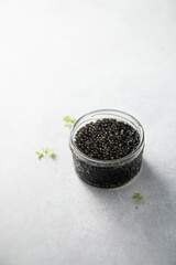 Black caviar in a jar