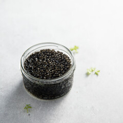 Black caviar in a jar