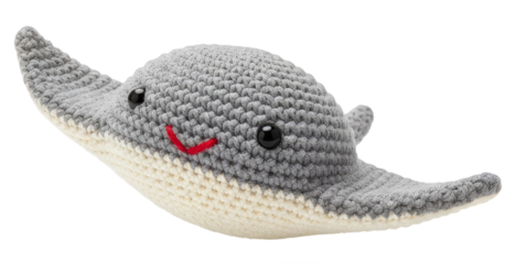 a grey and beige manta ray amigurumi marine animal with wide fins
