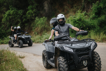 Friends riding ATVs through scenic natural trails, experiencing outdoors adventure, and bonding.