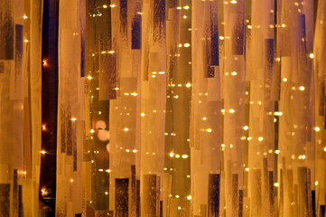 Obraz premium windows decorated with Christmas lights and ornaments