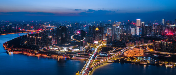 Tall-high Aerial View of Shengjing Theater and Hunhe Skyline Night Scene in Shenyang, Liaoning...