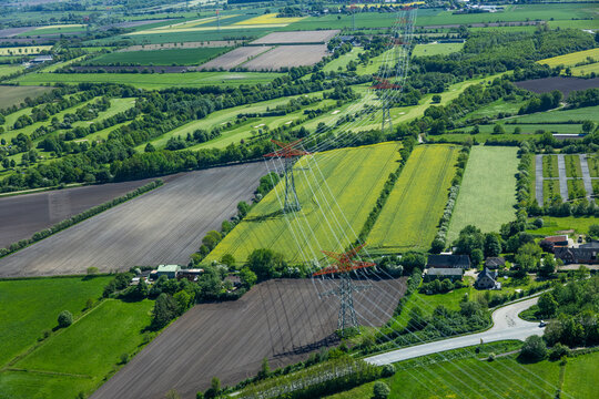 Aerial landscape foto of fields in summer over northern Germany and Denmark.