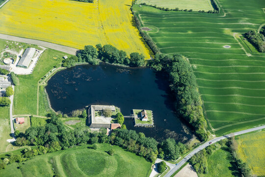 Aerial landscape foto of fields in summer over northern Germany and Denmark.