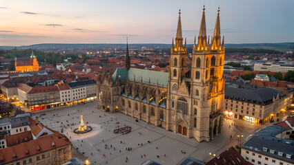 Aerial View of Milan Duomo Cathedral and Illuminated Cityscape at Dusk