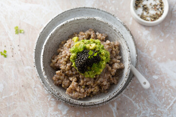 Green buckwheat with avocado and caviar