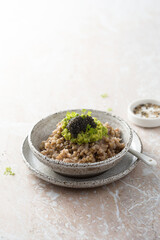 Green buckwheat with avocado and caviar