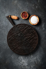 Food background at black kitchen table.