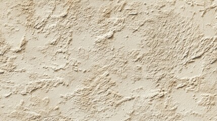 A close-up of a weathered beige exterior wall corner with a slightly rough texture,